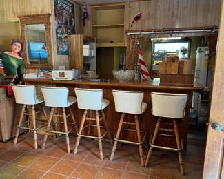 Five low-backed barstools can be found in the sale.