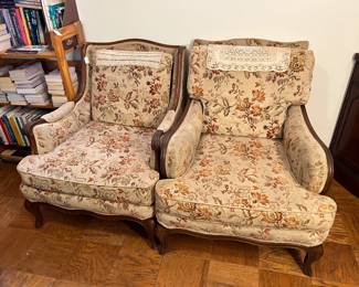 These chairs come close to matching, but have slightly different designs.