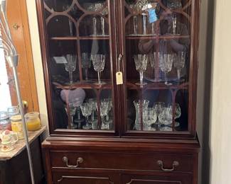 This china cabinet holds a set of stemware that is also worth a look.