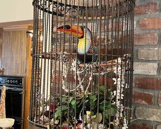 Who doesn't want a decorative toucan in a cage?  It certainly makes a statement.