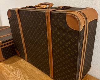 Vintage Louis Vuitton suit cases