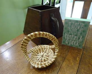 the Wooden Box in the back is an Antique Rice scooper (used in the rice fields)/Sweet Grass Basket from Charleston/ small sign sold