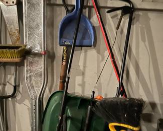 Seeder racks shovels and other misc garden tools 