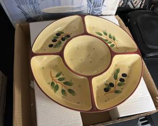 Assortment of platters  and bowls including many colorful fish platters from Italy 