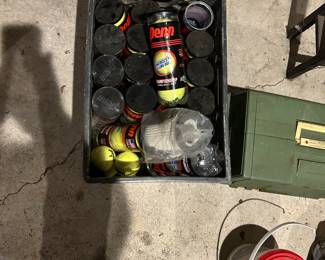 A bin of tennis balls