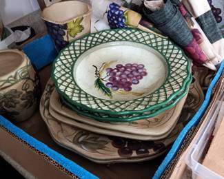 Dishes with wine print  and Cafe curtains. 
