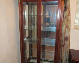 Another mirrored, lighted cabinet