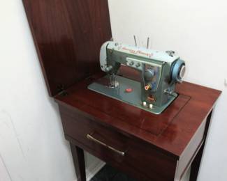 Vintage American Beauty sewing machine mahogany cabinet