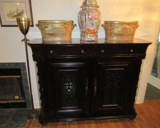 Marble top bar with wine storage on both sides.