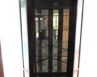 Massive corner curio cabinet
