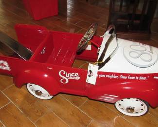 We just unboxed this beauty- State Farm 80th anniversary edition of this metal pedal tow truck.