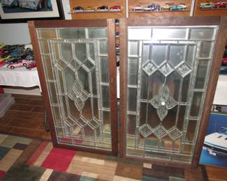 Heavy leaded glass panels.........mirrors on back can easily be removed to use as windows