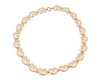 2
A Tiffany & Co. Gold Necklace
Designed as a series of 14K yellow gold open wave links, signed Tiffany & Co.

40.2 grams gross
15.5" L
Estimate: $1,200 - $1,500