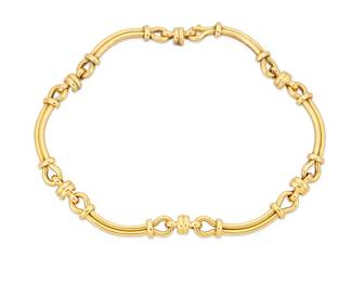 12
A Gold Necklace/Bracelet Combination
With detachable fittings to be worn as necklace or bracelet, in 18K yellow gold

51.9 gross grams
12.5" L
Estimate: $1,800 - $2,200