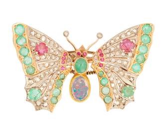 10
A Gem-Set Butterfly Brooch
The butterfly designed with en tremblent wings and set with an opal and 60 rose and single-cut diamonds to the openwork diamond, emerald and ruby eyes, in 14K yellow gold

18.92 grams gross
1" H x 1.75" W
Estimate: $300 - $500