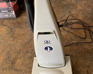 Riccar vacuum cleaner with bags and instructions (barely used—looks new)