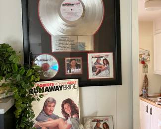 Platinum record album presented to Dorothy Sea Gazeley for her song “Before I Fall in Love”, performed by Coco Lee, from the soundtrack “Runaway Bride”