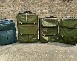 Three pieces of olive green American Tourister luggage - used but still very operable and useful! Great to use for moving or taking on a mission trip and leave.