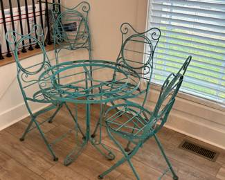 Mid-Century patio table and 4 folding chairs, metal