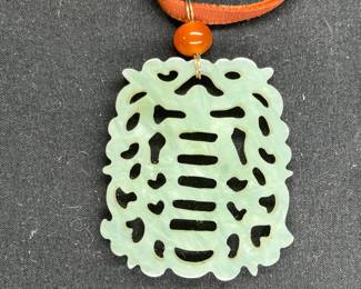 Jade Asian Inspired Pendant on brown Velvet Cord