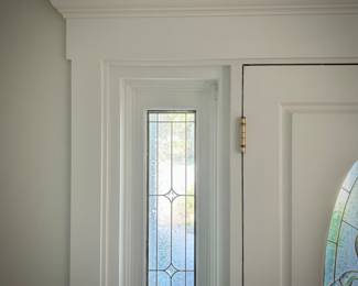 All doors, trim, moldings, wainscoting, and windows in house