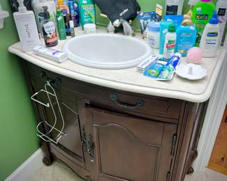 All bathroom light fixtures, mirrors, vanities, toilets, and medicine cabinets