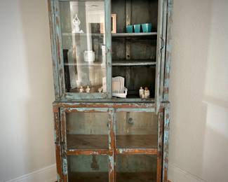 Blue distressed glass display cabinet from Washburn Imports