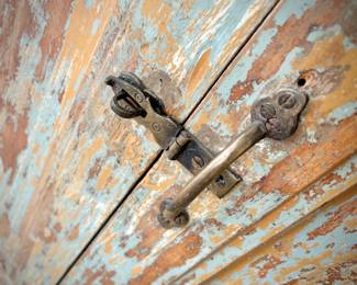 Warm-toned distressed china cabinet from Washburn Imports (36" width x 12" depth x 81" height) 