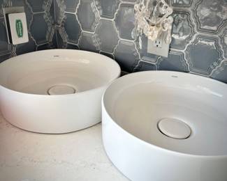 Two new, unused white Incepa countertop sinks