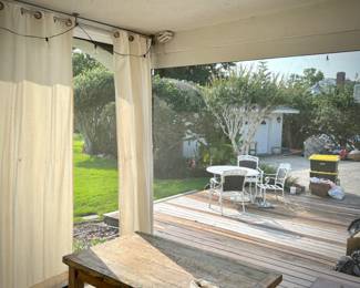 Porch sun/privacy drapes & rods, plus retractable screens