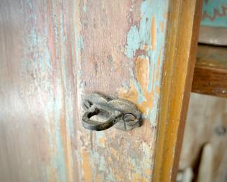 Warm-toned distressed china cabinet from Washburn Imports (36" width x 12" depth x 81" height) 