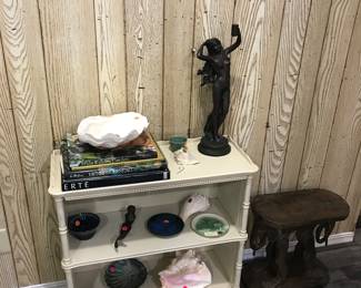 entry table bookcase, framed old florida poster print, large shells, enamel plates, mermaids, elephant table