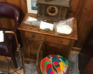 wood table and chair, clock, brass floor lamp, washstand cabinet