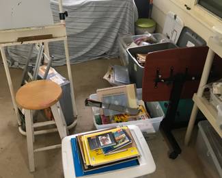 easel and stool, blank sketchbooks