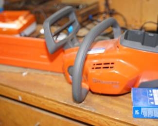 Husqvarna electric chain saw. online auction item 5/22- 5/29 