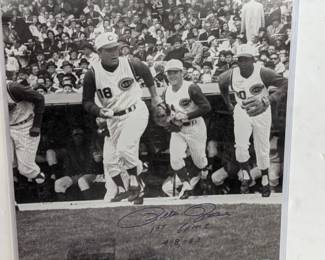 Lot 360: Autographed Pete Rose first game photo dated 4-8-63 with PSA DNA certification and autographed Pete Rose Rookie of the Year 1963 ball with authentic MLB hologram, photo measures 20" high x 16" wide