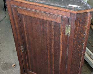 Lot 233: Antique primitive wall mount corner cabinet to include key; 37" high x 29" wide x 17.5" deep