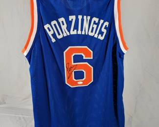 Lot 101: Autographed New York Knicks Porzingis jersey in size XL, JSA certified