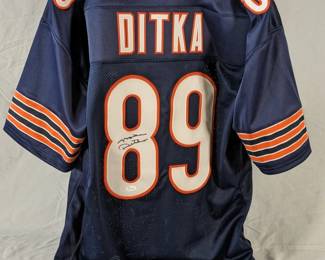 Lot 108: Autographed Chicago Bears Mike Ditka jersey in size XL with JSA certification card