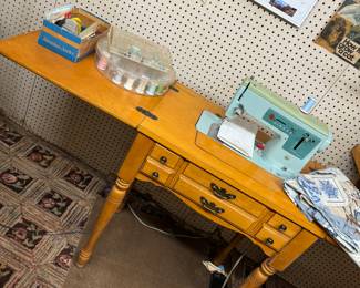 Sewing machine with cabinet