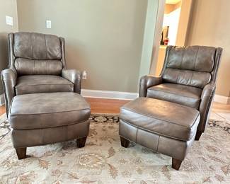 Beautiful leather chairs with Ottomans