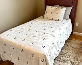 Twin beds with mattresses