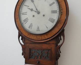Antique wall clock has its key $150