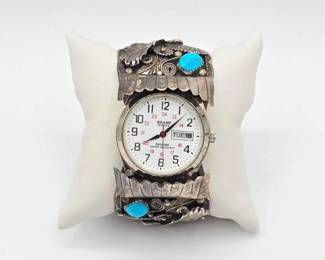 #912 • Sterling Silver Sharp Quartz Railroad Watch Cuff with Turquoise and Coral, 93.75g
