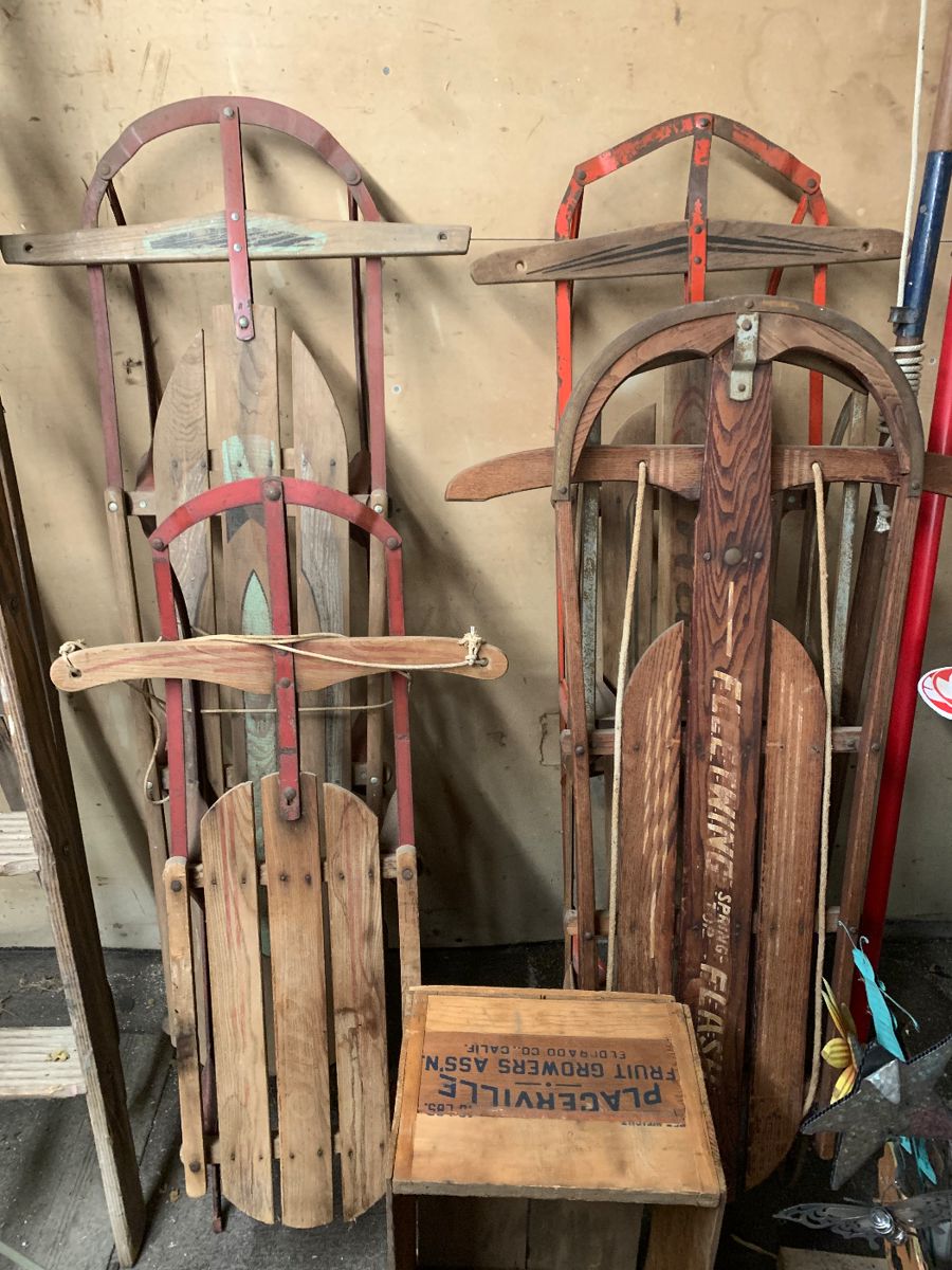 4 vintage sleds