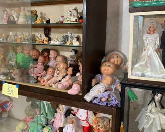 Doll and cat figurine collections