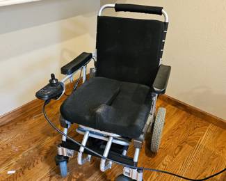 Motorized Wheelchair - Tested, works.  Battery may need replacing soon.