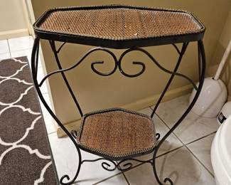 Wicker and metal table