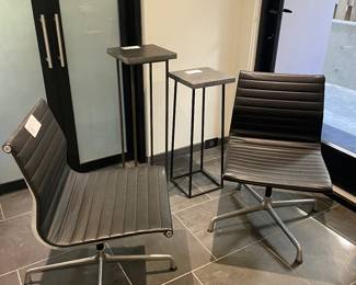 Pair of Eames chairs shown with granite tables. All available for presale in separate photos