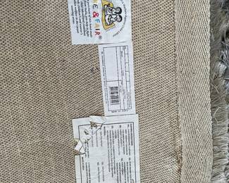 Information on the back of the carpet.